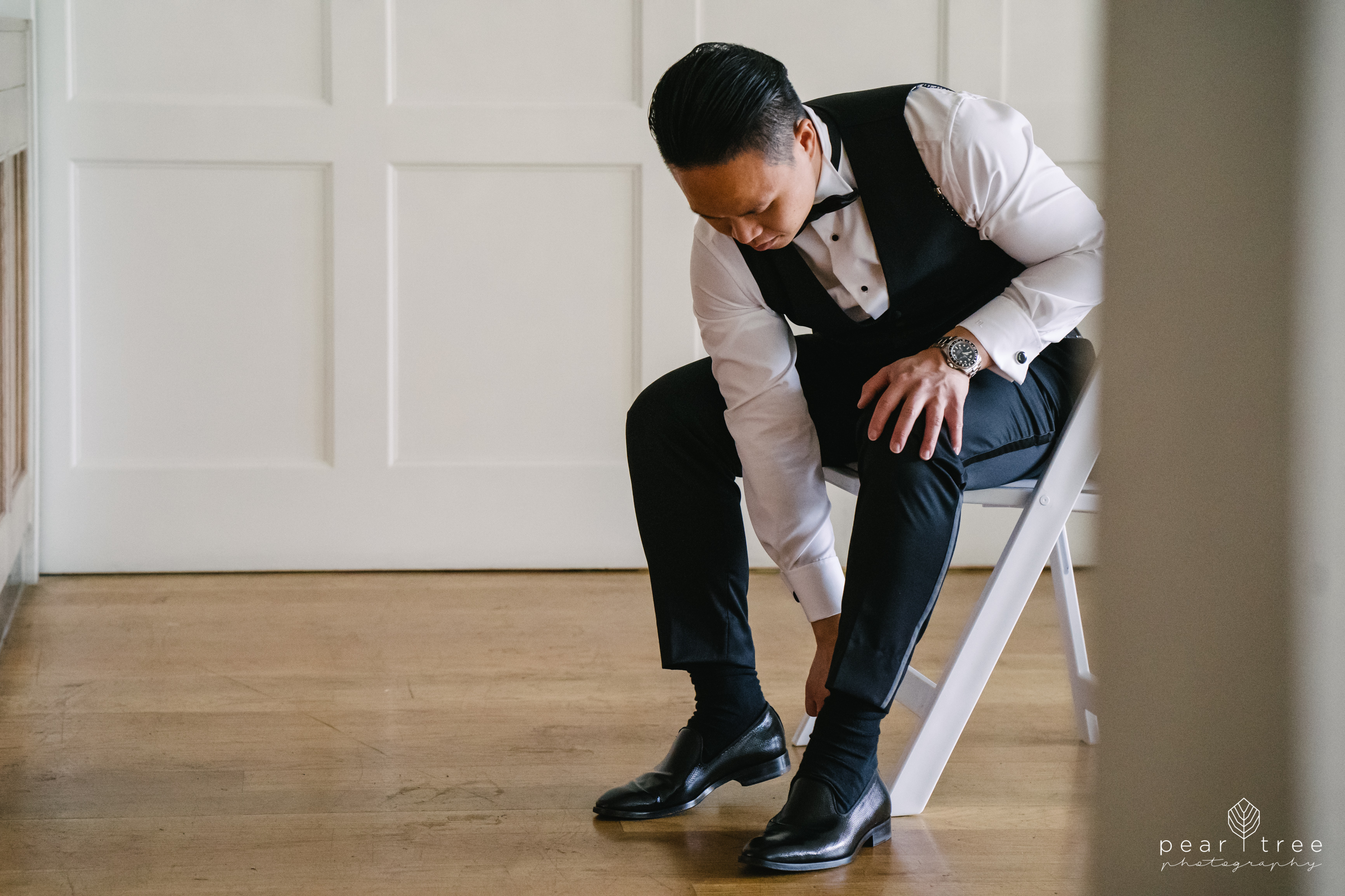 groom wedding morning pose